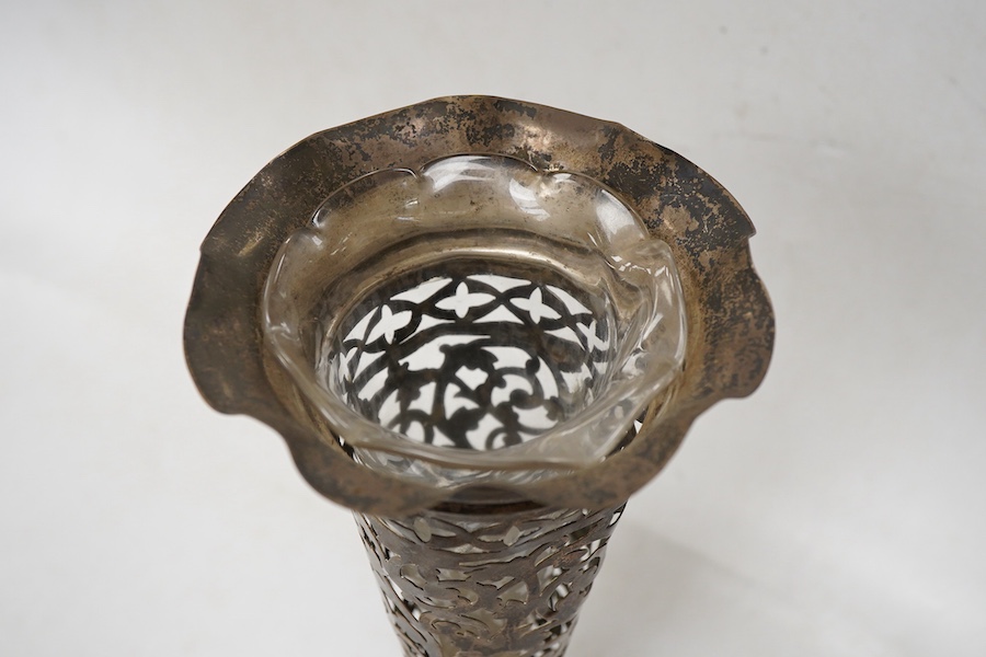 An Edwardian pierced silver trumpet shaped spill vase, by S. Blanckensee & Son Ltd, Birmingham, 1902, with glass insert, weighted, height 22.3cm.